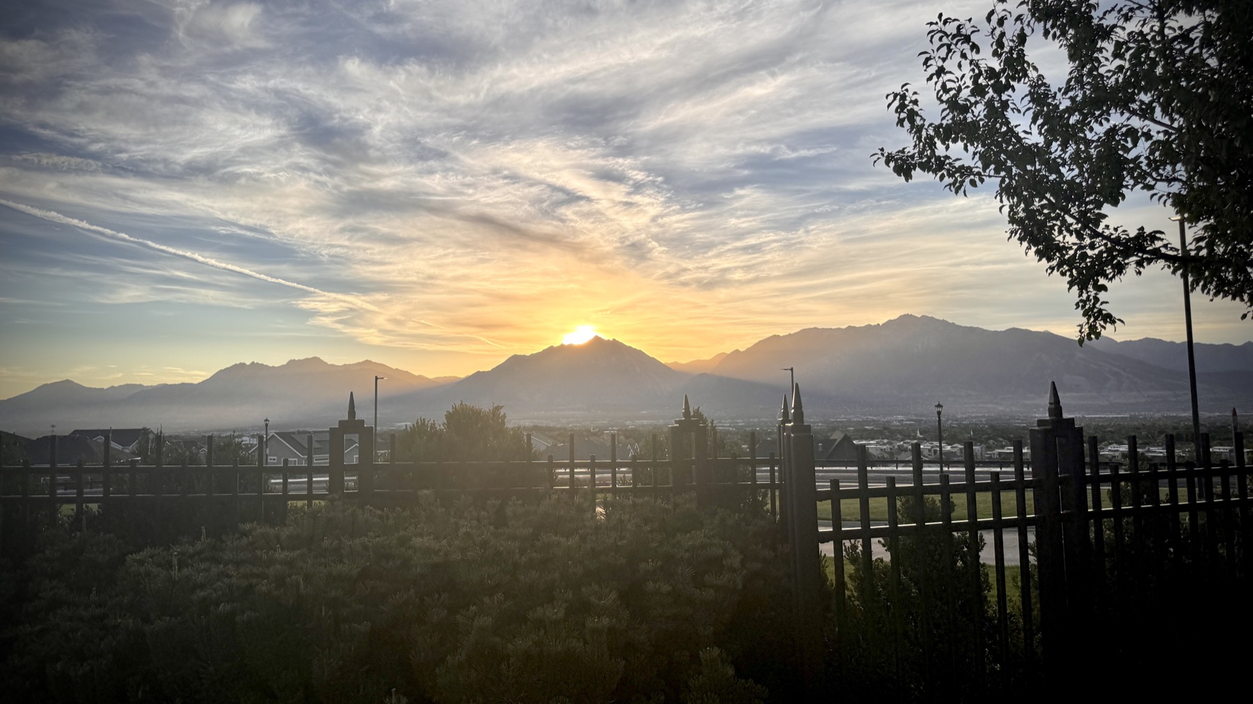 Sunset over mountains viewed from the temple grounds
